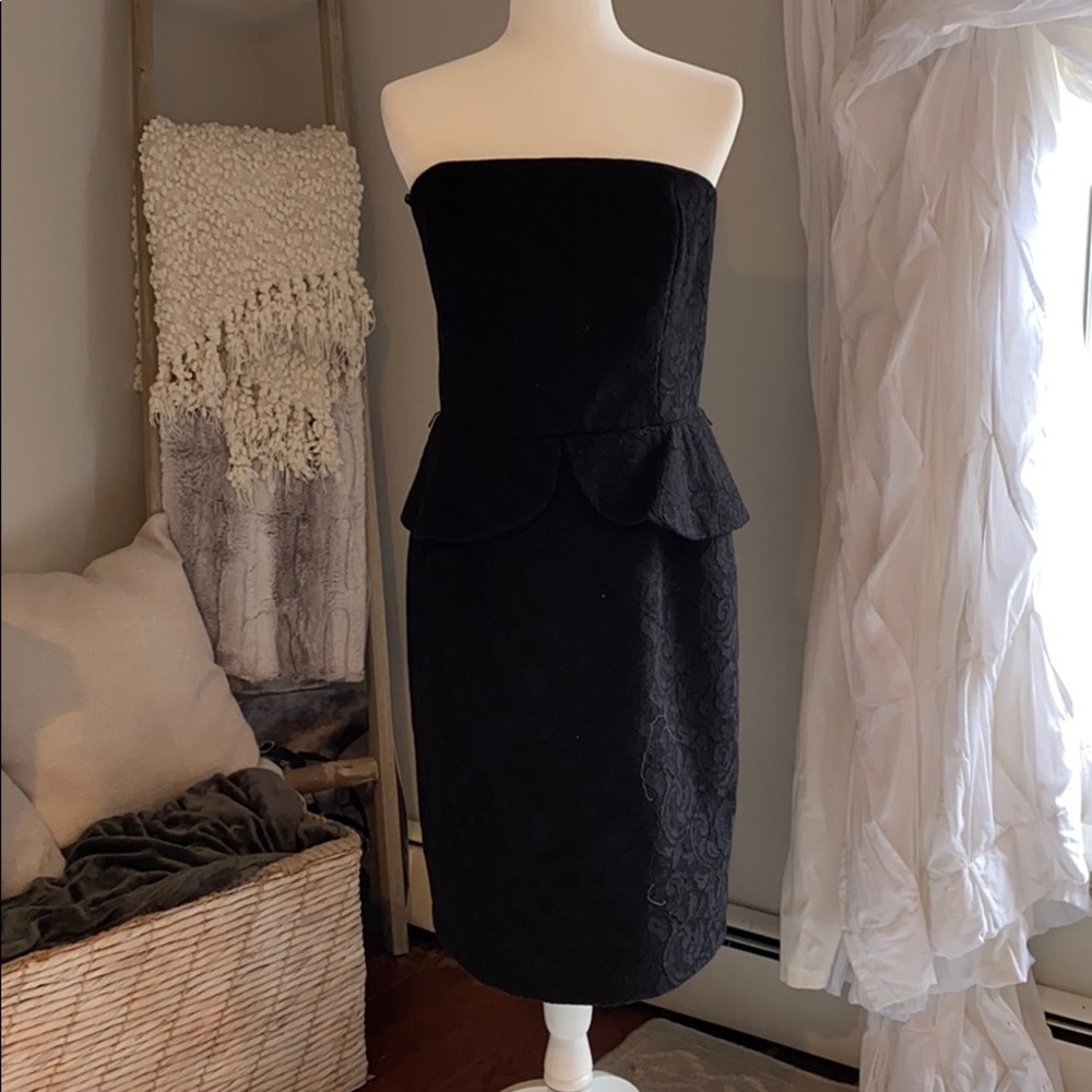 Black strapless, lace like, skirted at waist